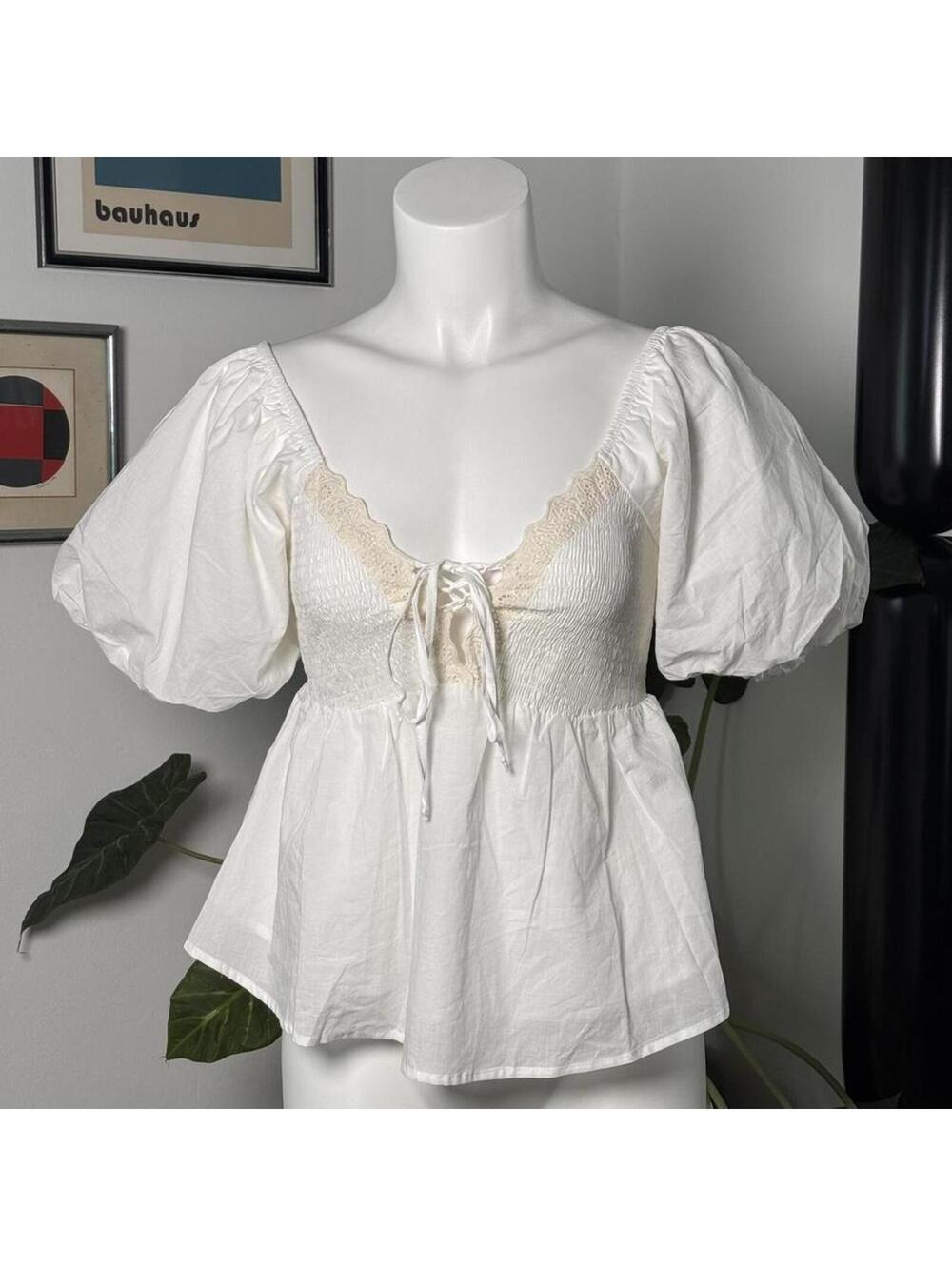 Soft romantic milkmaid top with puff sleeves and lace trim 🤍
